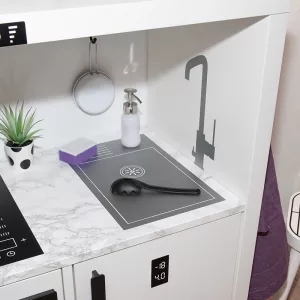 Sink and kitchen faucet in a Kallax kitchen