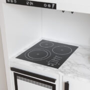 Cooktop with three heating elements on a Kallax shelf